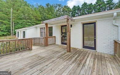 Updated and immaculate 4-side brick ranch located next to the