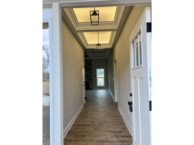 Another Custom Featured Home Under Construction! This beautiful