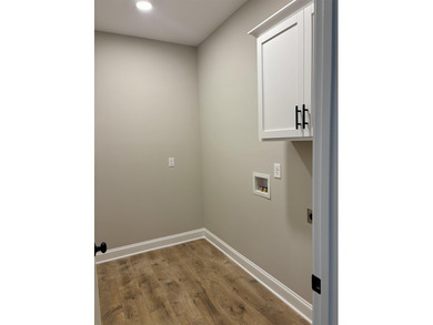 Another Custom Featured Home Under Construction! This beautiful