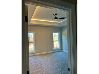 Another Custom Featured Home Under Construction! This beautiful