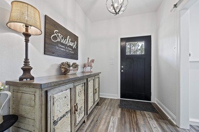 Tucked away on over 17 private acres, this custom-built home - photo 22