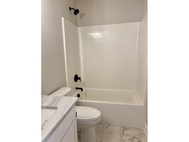 Another Custom Featured Home Under Construction! This beautiful