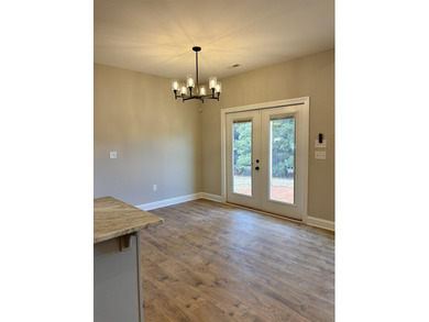 Another Custom Featured Home Under Construction! This beautiful