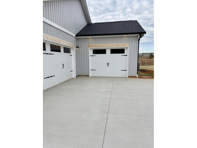 Another Custom Featured Home Under Construction! This beautiful