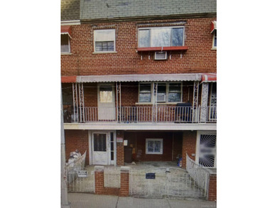 This legally classified two-family residential property in the - photo 1