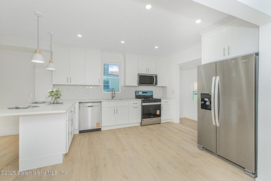 Discover your dream home at 11 Laforge Ave! This renovated - photo 6