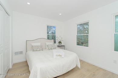 Discover your dream home at 11 Laforge Ave! This renovated - photo 9