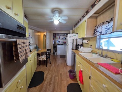 This 2 bed 2 bath home is located in Shangri-La a 45+ Community - photo 3