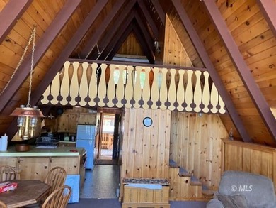 The main A-frame house and two smaller A-frame cabins over - photo 9