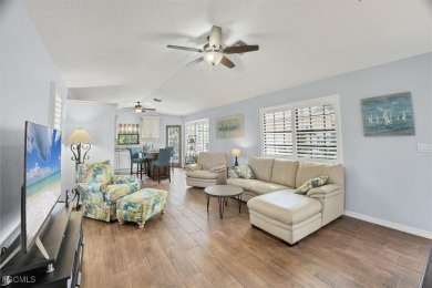 Discover effortless coastal charm in this rare end-unit villa