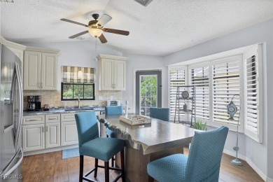 Discover effortless coastal charm in this rare end-unit villa