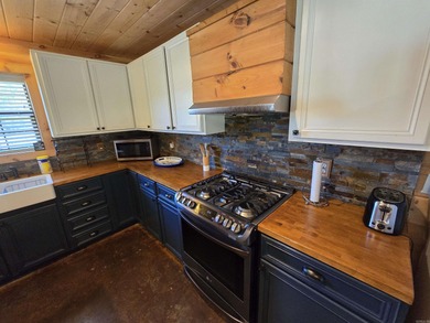 Introducing your dream lakefront getaway! This stunning, fully - photo 8