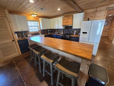 Introducing your dream lakefront getaway! This stunning, fully - photo 10