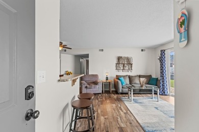 Welcome to this charming 2-bedroom, 2-bathroom condo located - photo 3
