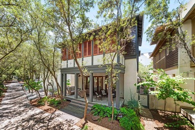 This timeless, Rosemary Beach home offers an inviting covered - photo 3