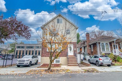 Rare find! This legal three-family home offers exceptional - photo 3