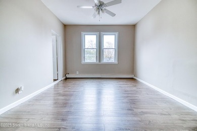 Rare find! This legal three-family home offers exceptional - photo 5