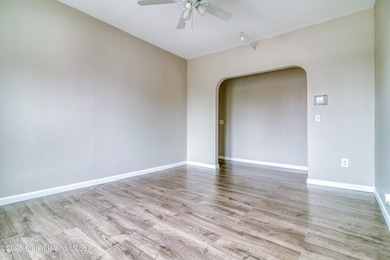 Rare find! This legal three-family home offers exceptional - photo 6