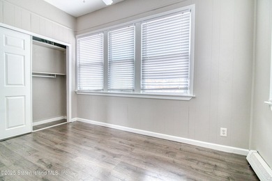 Rare find! This legal three-family home offers exceptional - photo 7