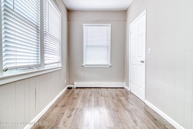 Rare find! This legal three-family home offers exceptional - photo 8