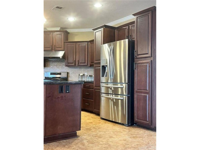 Well-maintained home on approximately 6 acres with a stocked