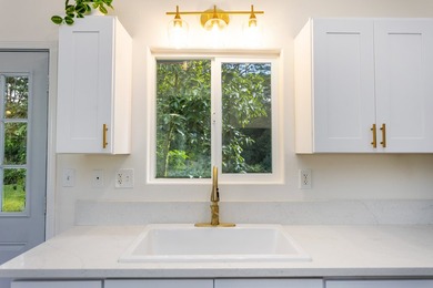 Tucked away on a lush 1-acre lot in Hawaiian Paradise Park, this - photo 11