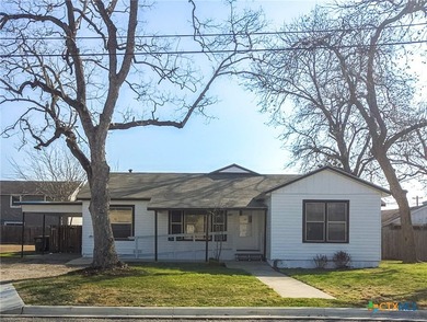 Beautifully updated 6-bedroom, 3-bath home with two living rooms