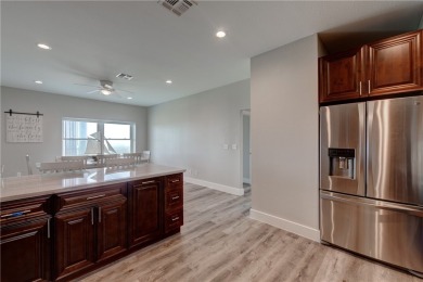 VIEWS! VIEWS! VIEWS! This is a top, third floor end unit with