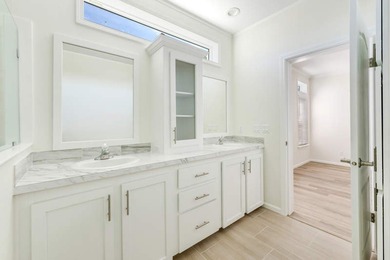 The Azalea, a premier coastal cottage, designed by an - photo 13