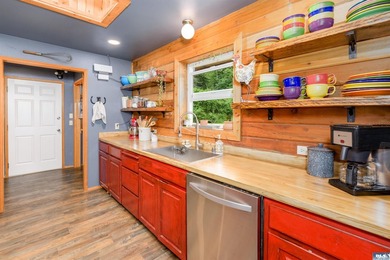 Tucked away on 4.7 beautiful acres, this stunning log home - photo 14