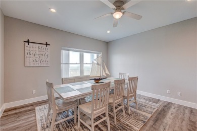 VIEWS! VIEWS! VIEWS! This is a top, third floor end unit with