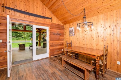 Tucked away on 4.7 beautiful acres, this stunning log home - photo 16