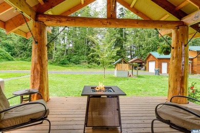 Tucked away on 4.7 beautiful acres, this stunning log home - photo 17