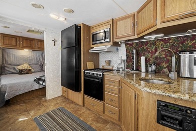 Welcome to waterfront living in the gated community of Sun Eagle - photo 9
