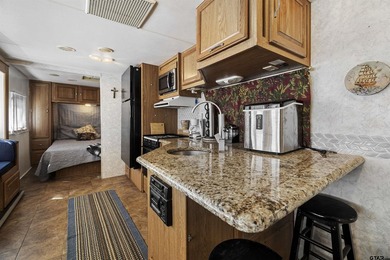 Welcome to waterfront living in the gated community of Sun Eagle - photo 10