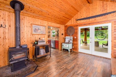 Tucked away on 4.7 beautiful acres, this stunning log home - photo 20