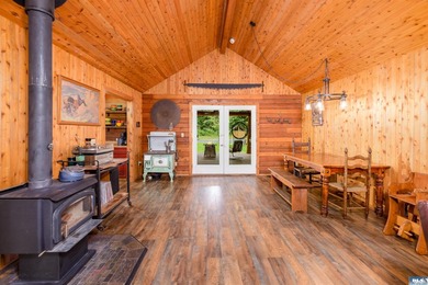 Tucked away on 4.7 beautiful acres, this stunning log home - photo 21