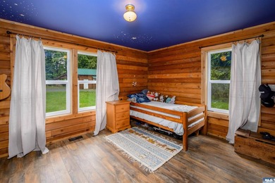 Tucked away on 4.7 beautiful acres, this stunning log home - photo 29