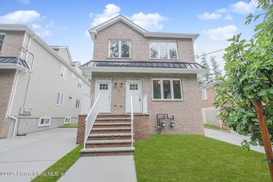 NEW CONSTRUCTION! Beautiful TWO family custom 6 over 6 home - photo 1