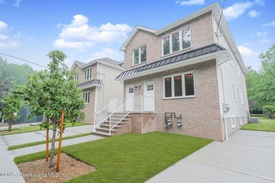 NEW CONSTRUCTION! Beautiful TWO family custom 6 over 6 home - photo 3