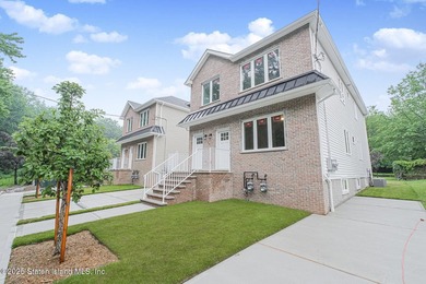 NEW CONSTRUCTION! Beautiful TWO family custom 6 over 6 home - photo 4