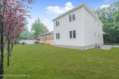 NEW CONSTRUCTION! Beautiful TWO family custom 6 over 6 home - photo 5
