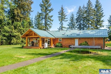 Tucked away on 4.7 beautiful acres, this stunning log home - photo 36