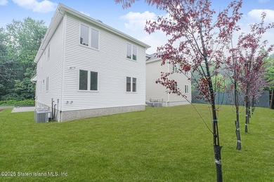 NEW CONSTRUCTION! Beautiful TWO family custom 6 over 6 home - photo 6