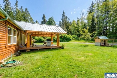 Tucked away on 4.7 beautiful acres, this stunning log home - photo 41