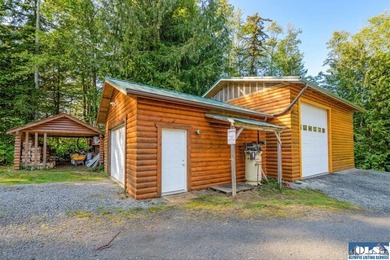 Tucked away on 4.7 beautiful acres, this stunning log home - photo 42