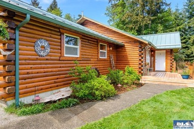 Tucked away on 4.7 beautiful acres, this stunning log home - photo 49