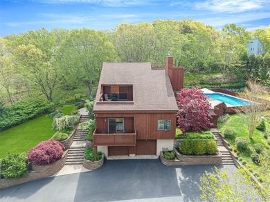 Set within the quiet Rolling Woods neighborhood on a shy acre at - photo 2