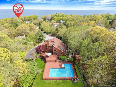 Set within the quiet Rolling Woods neighborhood on a shy acre at - photo 3