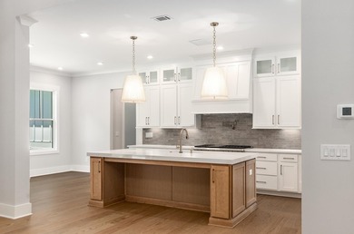 This stunning home includes a private, assigned boat slip on the - photo 13